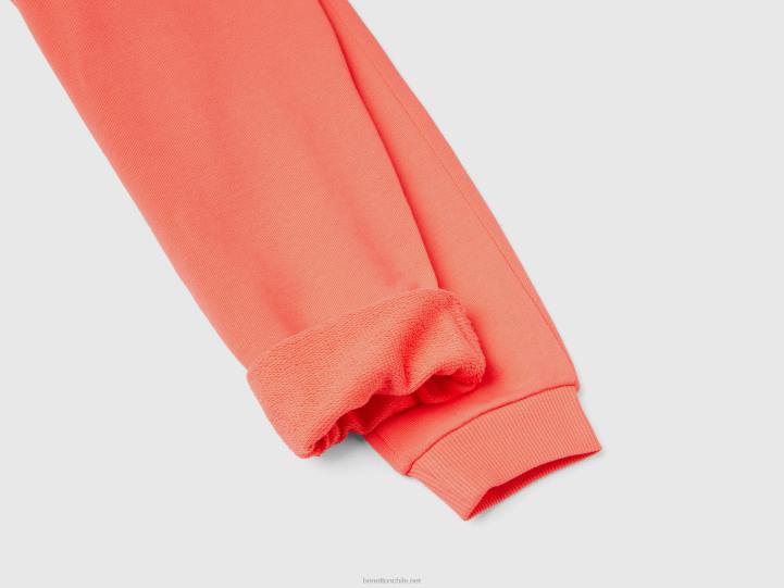 pantalones deportivos con logo NHBF2644 coral naranja niños Benetton