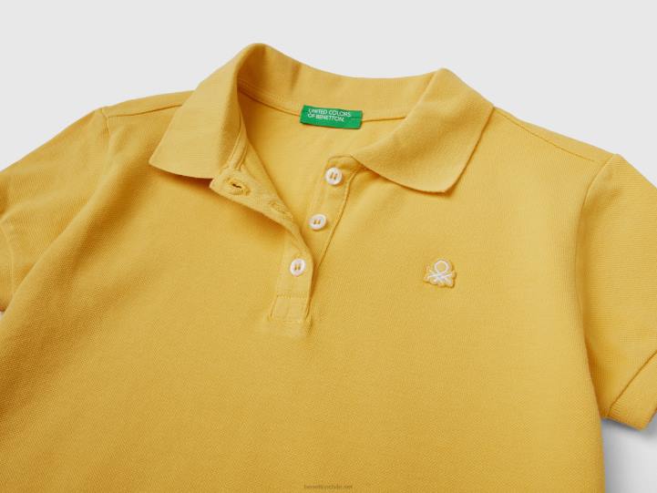 polo de manga corta en algodón orgánico NHBF2483 amarillo niños Benetton