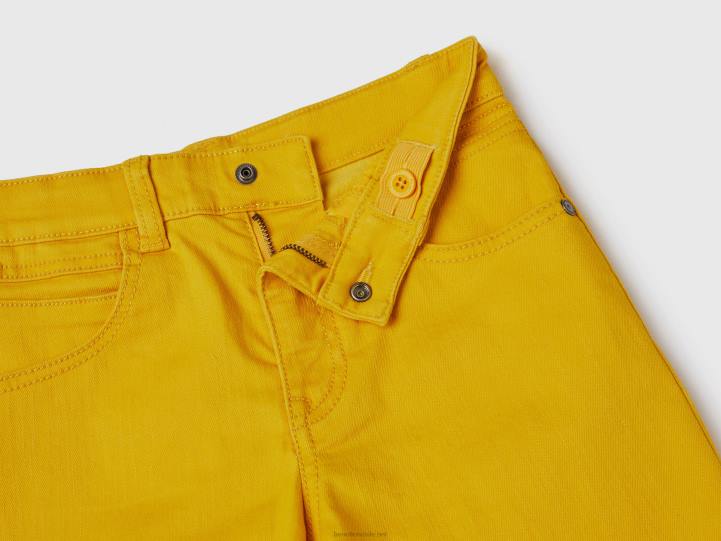 bermudas slim fit NHBF4965 amarillo niños Benetton